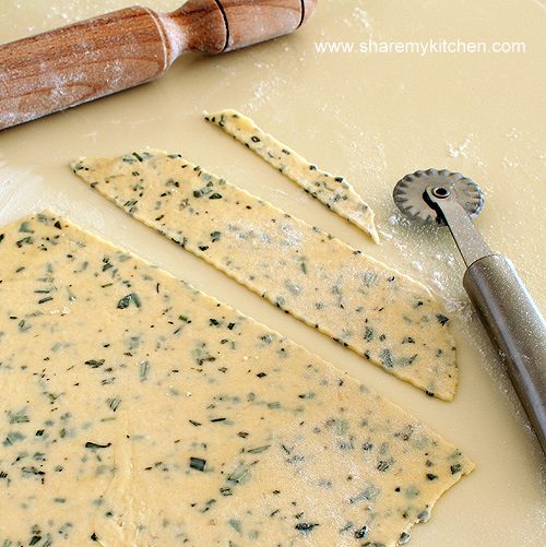 rolling-out-the-parmesan-crackers-dough-6663606