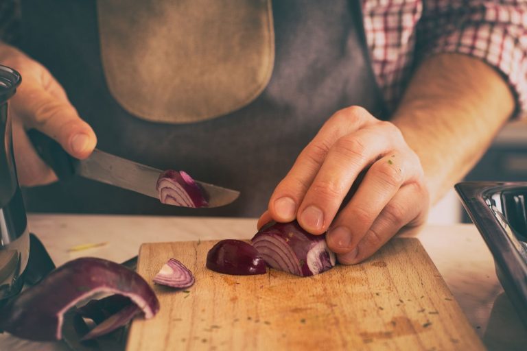 cutting red onion